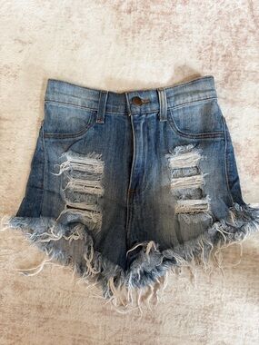 Distressed High-Rise Denim Shorts in Light Blue
